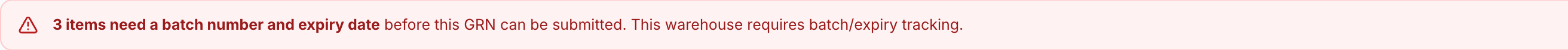 A red validation banner reading that N items need a batch number and expiry date before the GRN can be submitted, because the warehouse requires batch/expiry tracking.